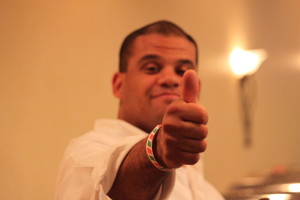 Guy making a thumb up gesture